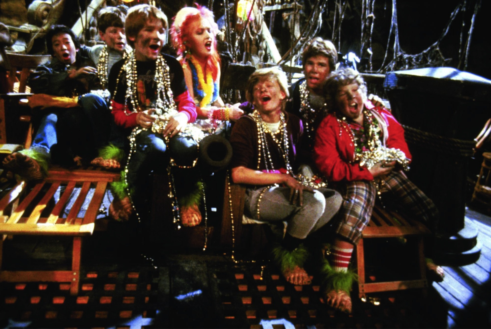 Still of Sean Astin, Corey Feldman, Martha Plimpton, Josh Brolin, Jeff Cohen, Cyndi Lauper and Jonathan Ke Quan in The Goonies (1985)