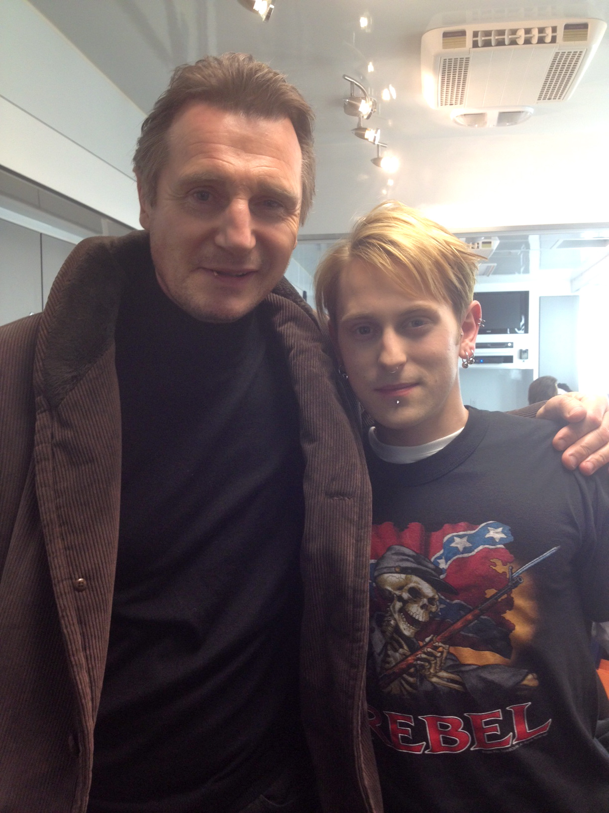 Eric Nelsen and Liam Neeson on set of 