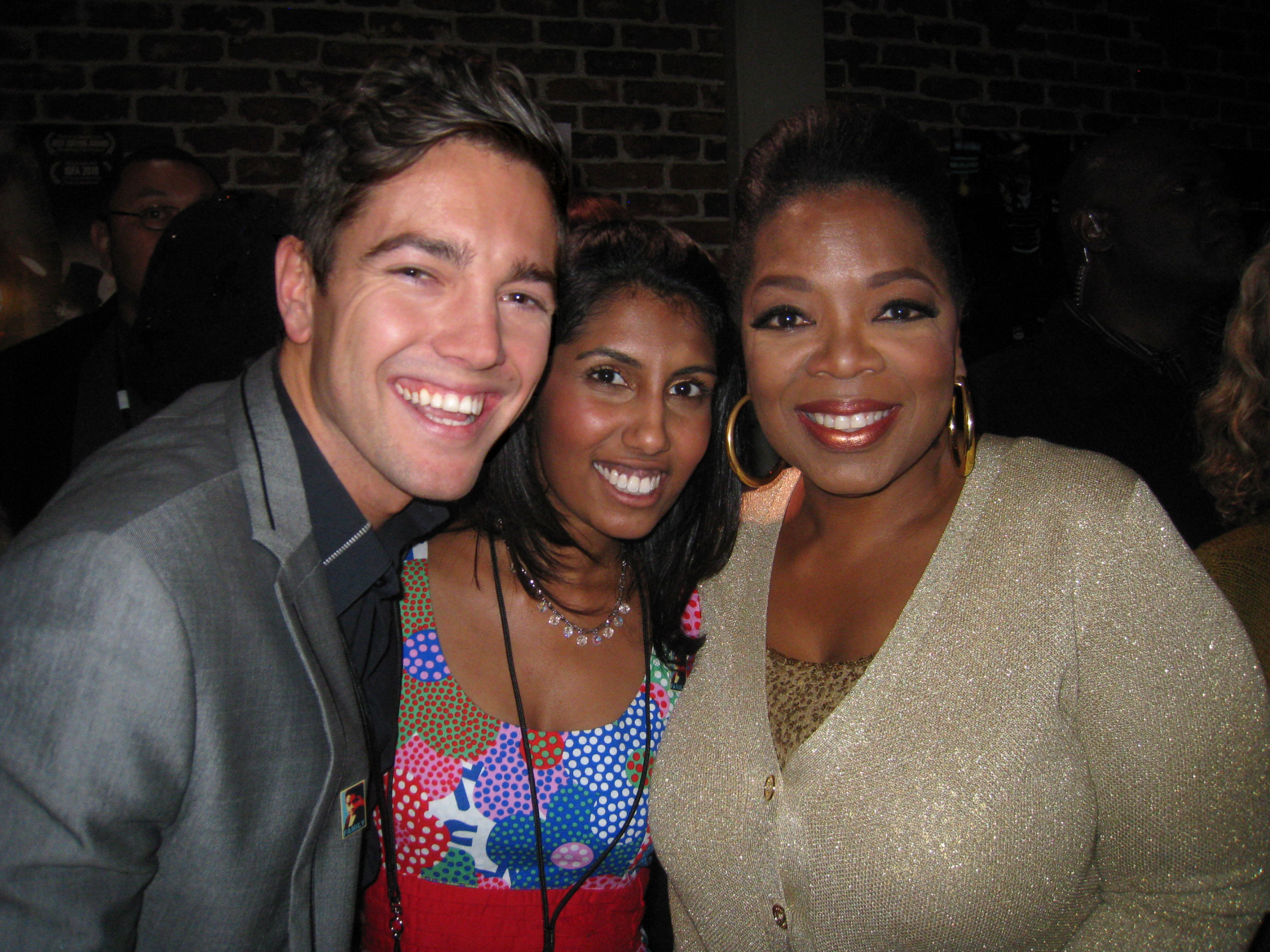 65_RedRoses filmmakers Nimisha Mukerji and Philip Lyall with Oprah at OWN Doc Club launch, Sundance 2011.