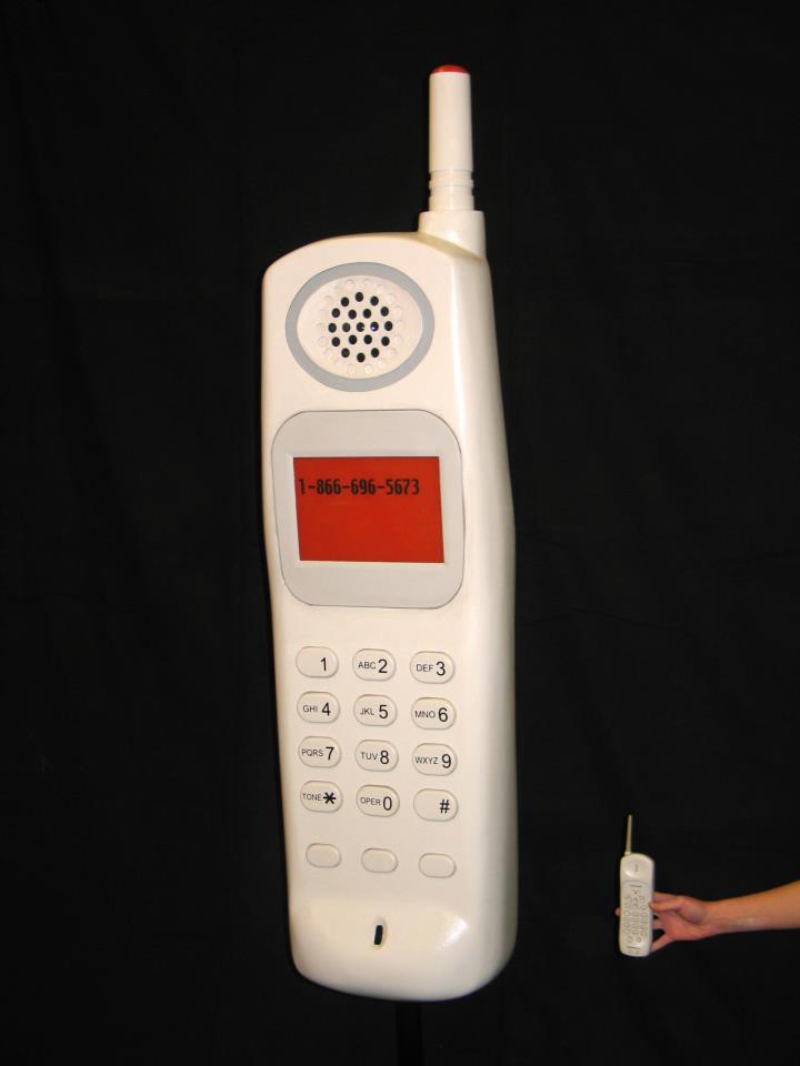 Oversized 6' phone for trade show, one button activated internal digital message.