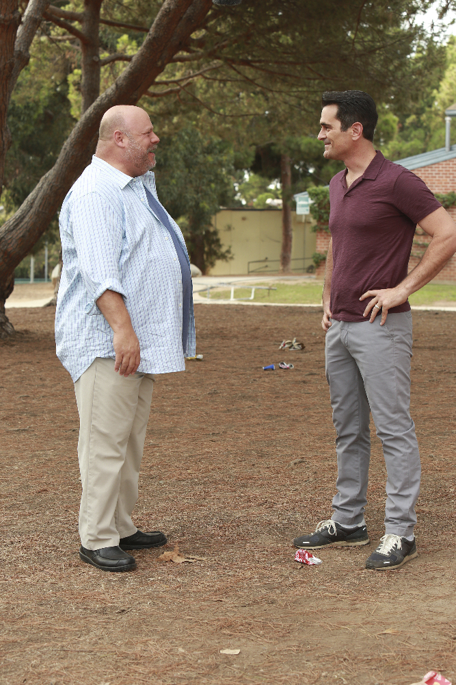 Still of Ty Burrell and Kevin Chamberlin in Moderni seima (2009)
