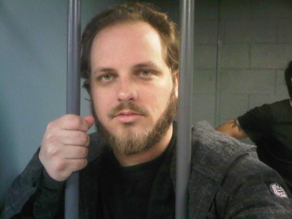 Justin Nesbitt in jail on the set of Alien Encounters 3