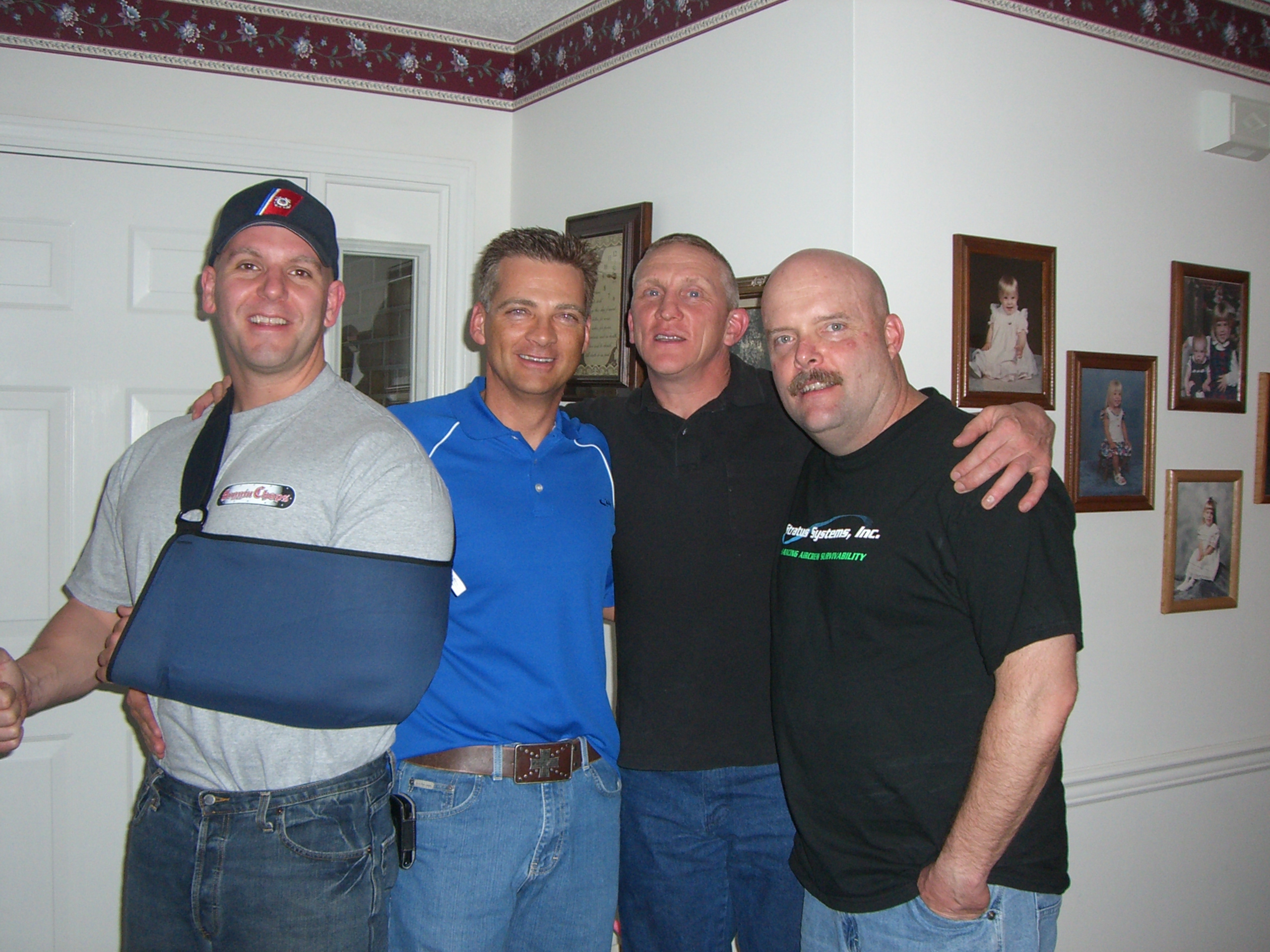 The Guardian - U.S. Coast Guard Rescue Swimmers with Technical Coordinator, Jeff Loftus (in blue)