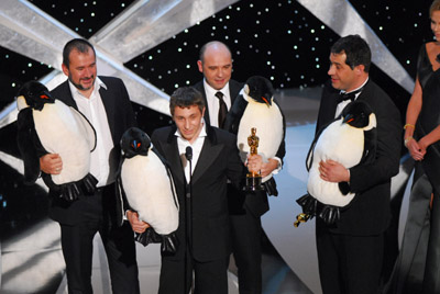 Luc Jacquet, Yves Darondeau and Christophe Lioud at event of The 78th Annual Academy Awards (2006)