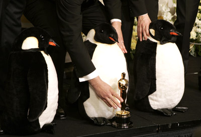 Luc Jacquet, Yves Darondeau and Christophe Lioud at event of The 78th Annual Academy Awards (2006)