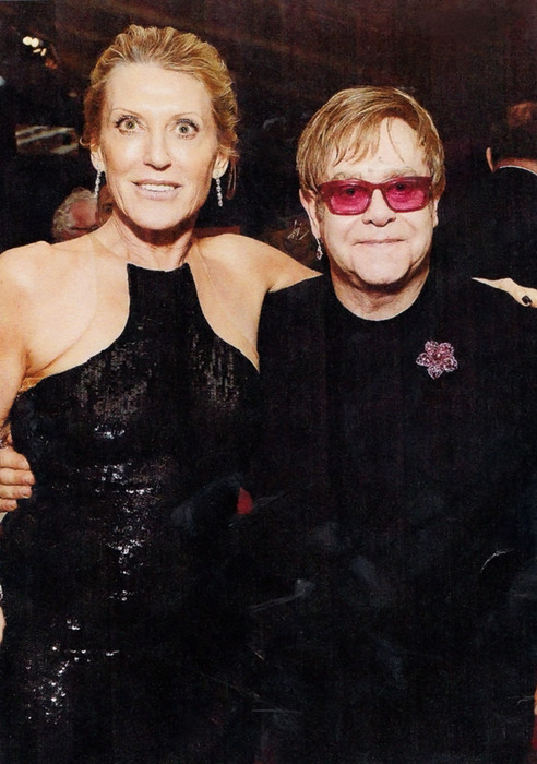 From L to R: Grazka Taylor and Elton John.