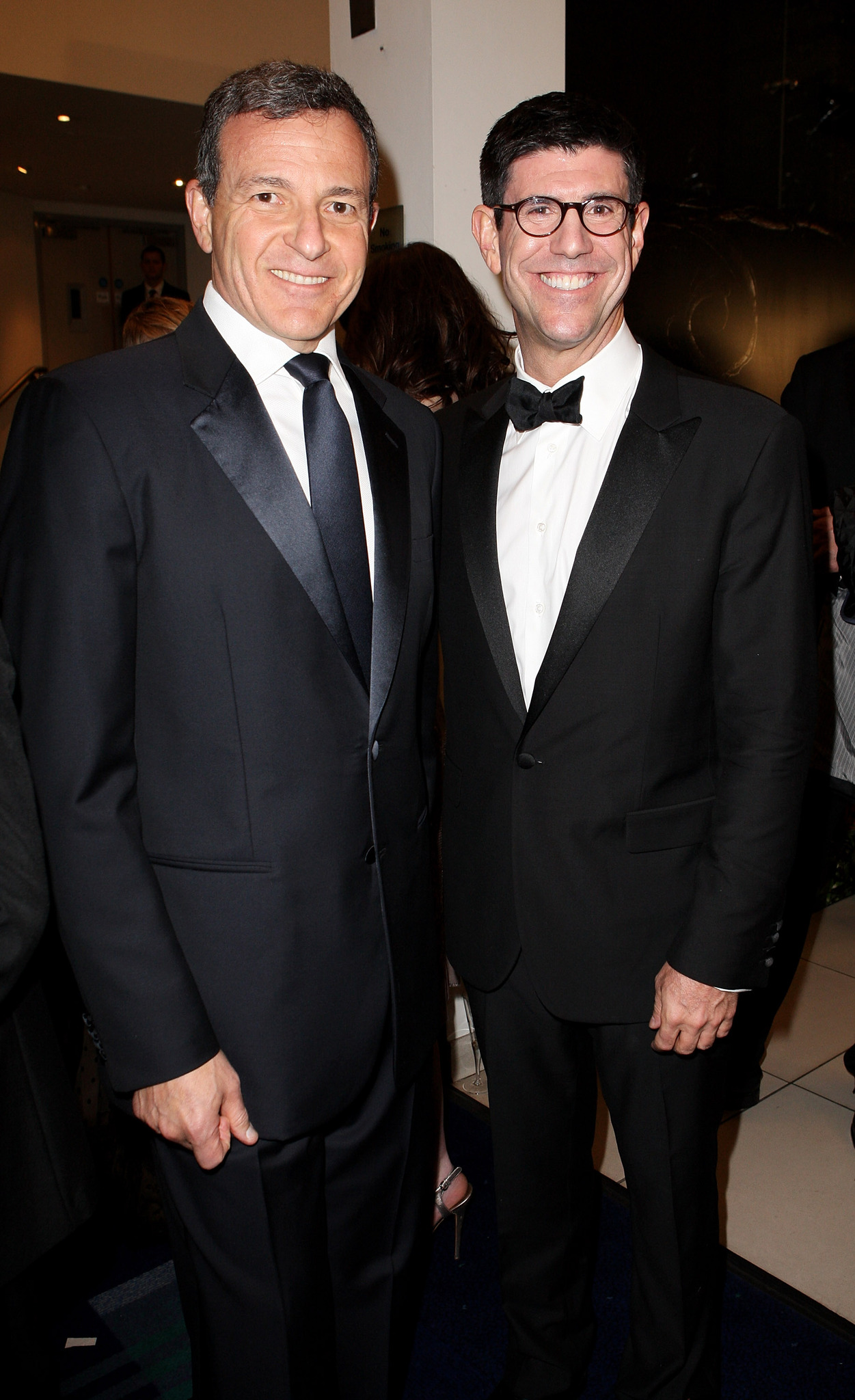 Robert A. Iger and Rich Ross at event of Alisa stebuklu salyje (2010)
