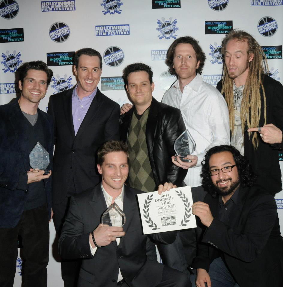 TOP (L-R): Scott Bailey, Anthony Hansen, Josh Roman, Johnny Scalco and Azmyth Kaminski, BOTTOM (L-R): Doug Maguire and Emilio Rossal pose on the red carpet at the 2012 Hollywood Reel Independent Film Festival where their movie Bank Roll won three awards.