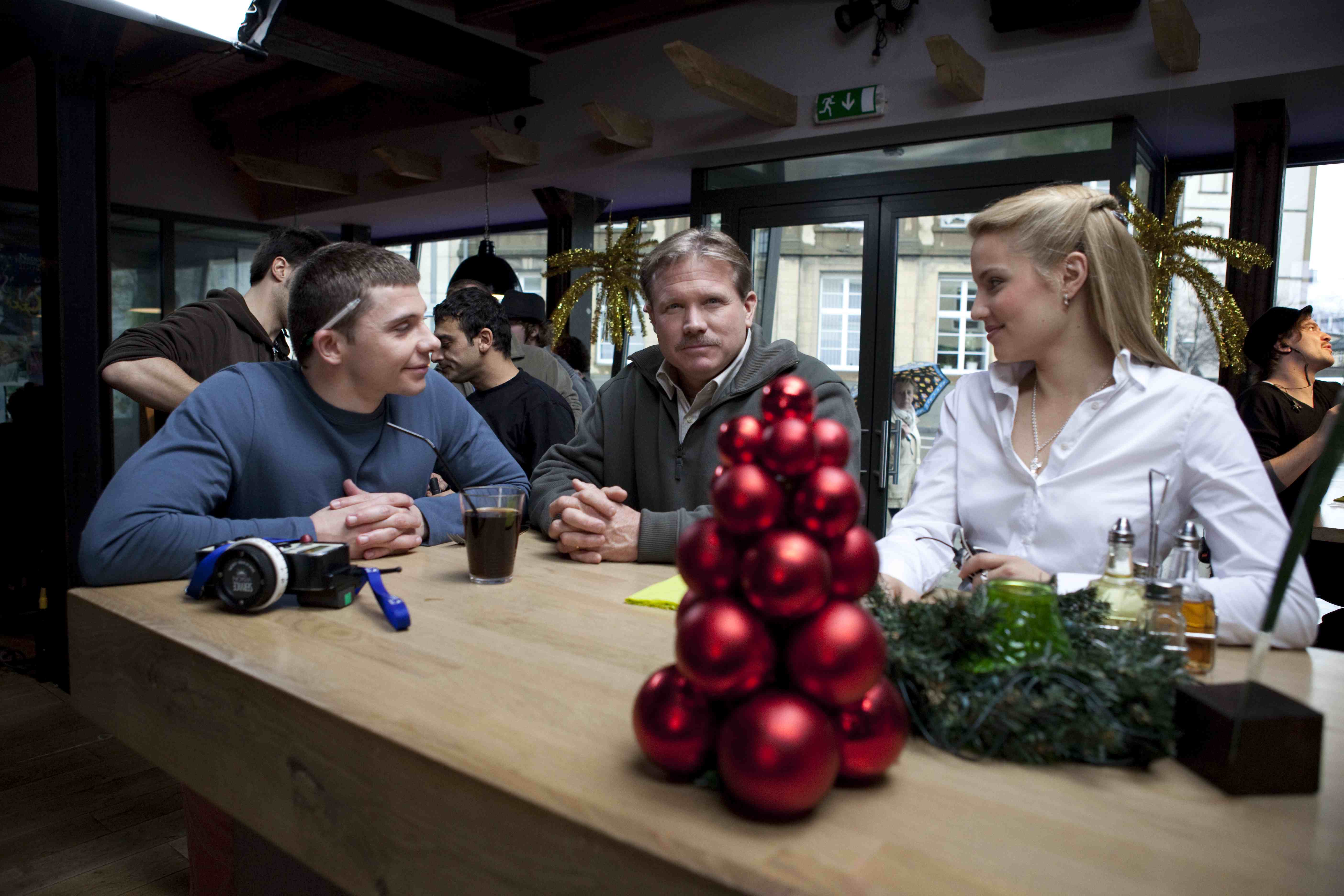 Jay Brown, Tony Becker and Dianna Agron in between takes on the set of The Hunters