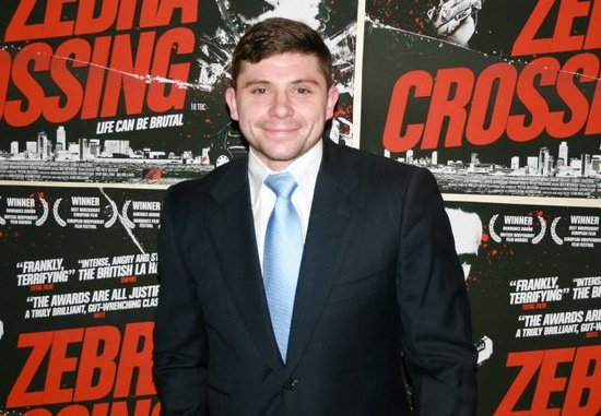 Jay Brown on the red carpet at the Empire Leicester Square premier of Zebra Crossings