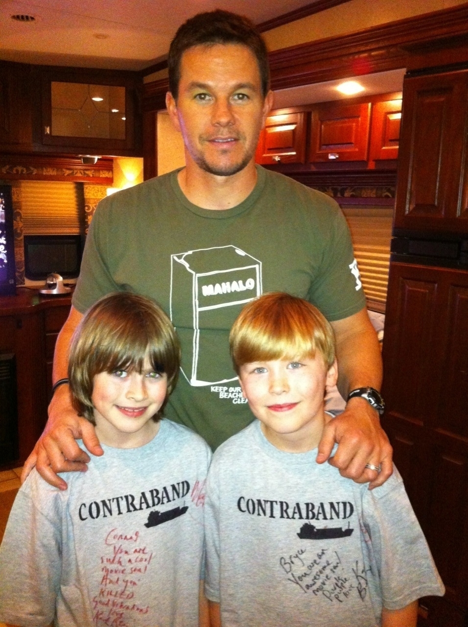 Connor Hill and Mark Wahlberg and Bryce McDaniels on the set of Contraband