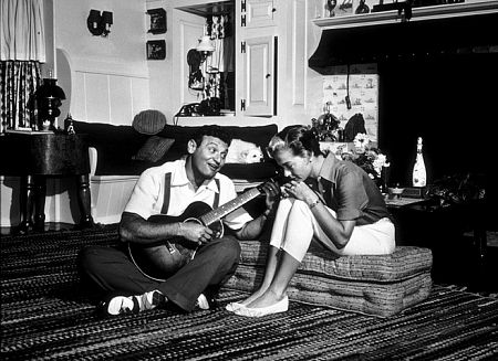 Frankie Laine and his wife, Nan Grey, at home in Los Angeles, CA, 1954.