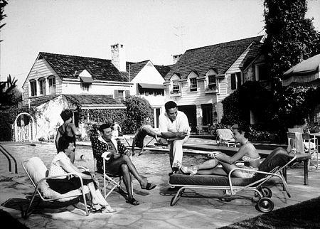 Frankie Laine with Terry Fischer, Duke Goldstone, and Nan Grey, in Beverly Hills, CA, 1954.