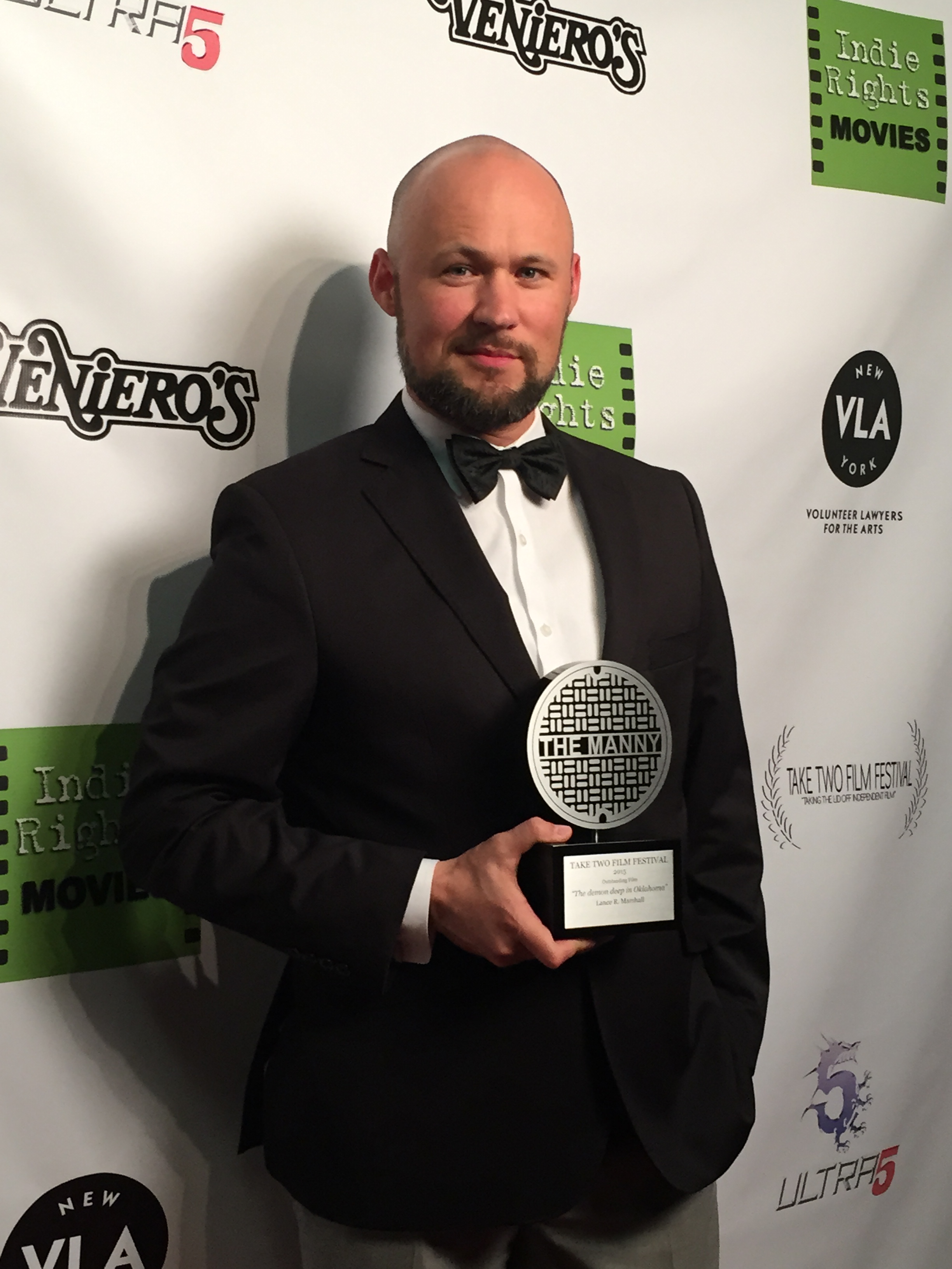 Accepting award for Outstanding Film 'The Demon Deep in Oklahoma' at the Take Two Film Festival in New York City on Apr 12, 2015.