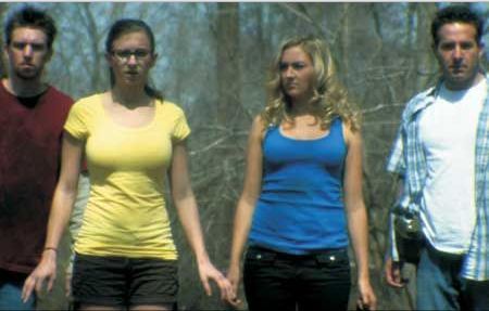 Still of Erik A. Williams, Stephanie Lomenick, Liana Werner-Gray, and Andrew Roth in The Man in the Maze (2011)