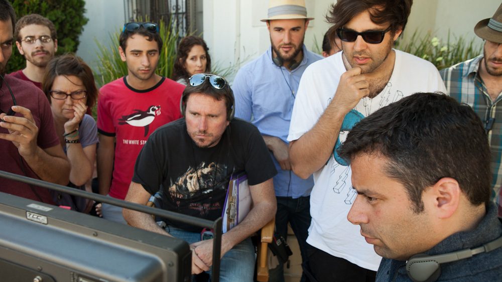 Director Michael Mohan (in sunglasses) with producers Jordan Horowitz and Michael Roiff on the set of Save the Date