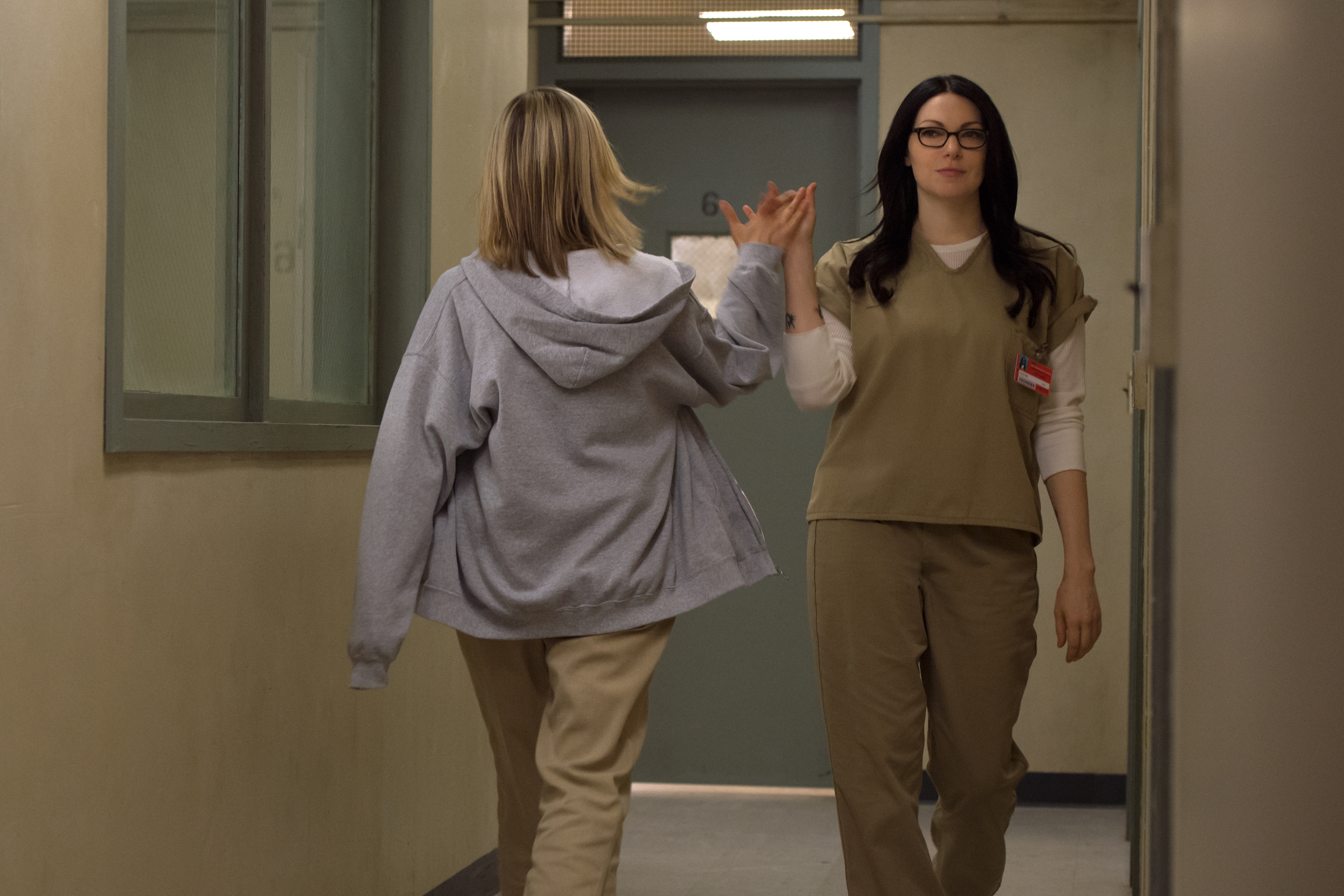 Still of Laura Prepon and Taylor Schilling in Orange Is the New Black (2013)