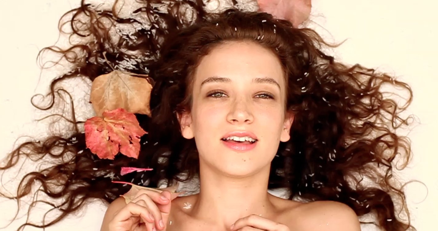 Still of Jessica Chapnik Kahn in music video for Appleonia