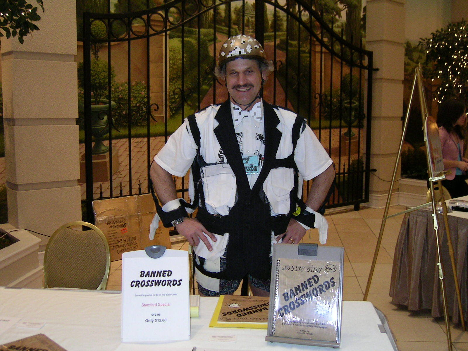 Jim Jenista at the 2006 American Crossword Puzzle Tournament, with his book, 