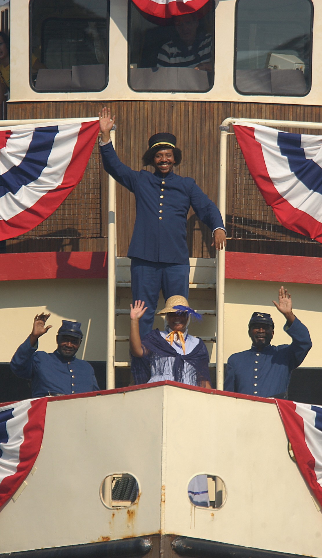 The crew of escaped slaves cheer aboard their stolen Confederate ship the 