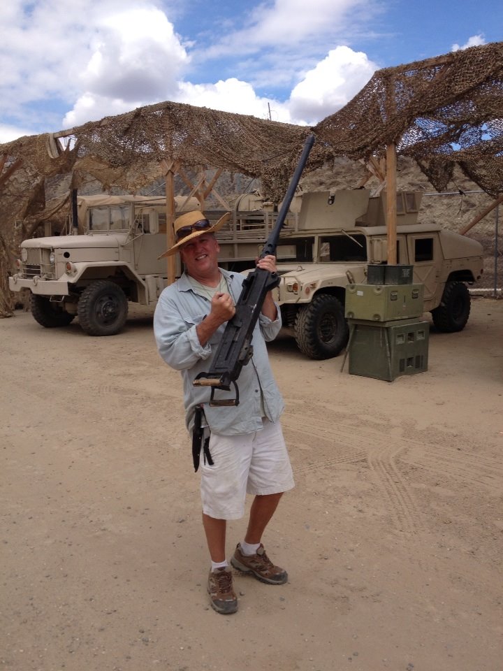 Military Tech consultant Lance Miccio rigging 50 cal on Humvee