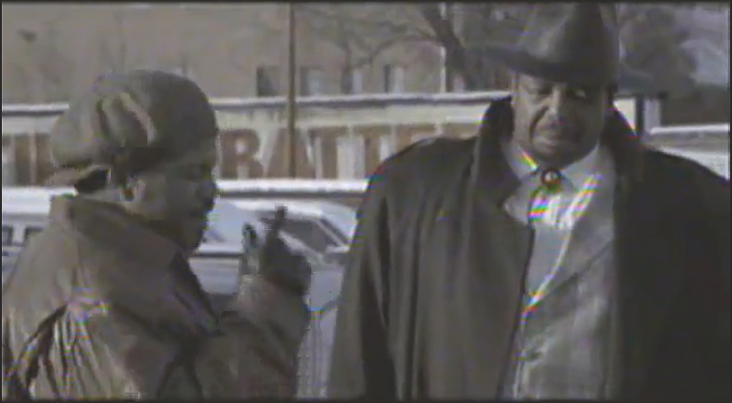 Ice Cube and Big LLou Johnson in a scene from the first Barbershop.