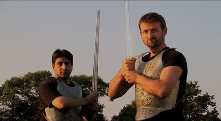 Christopher Dane, as Michael and Abbas Daya, as Gabriel stand guard over one of the first guardians in Into the Darkness. Filmed in Cambridgeshire UK July 2005.