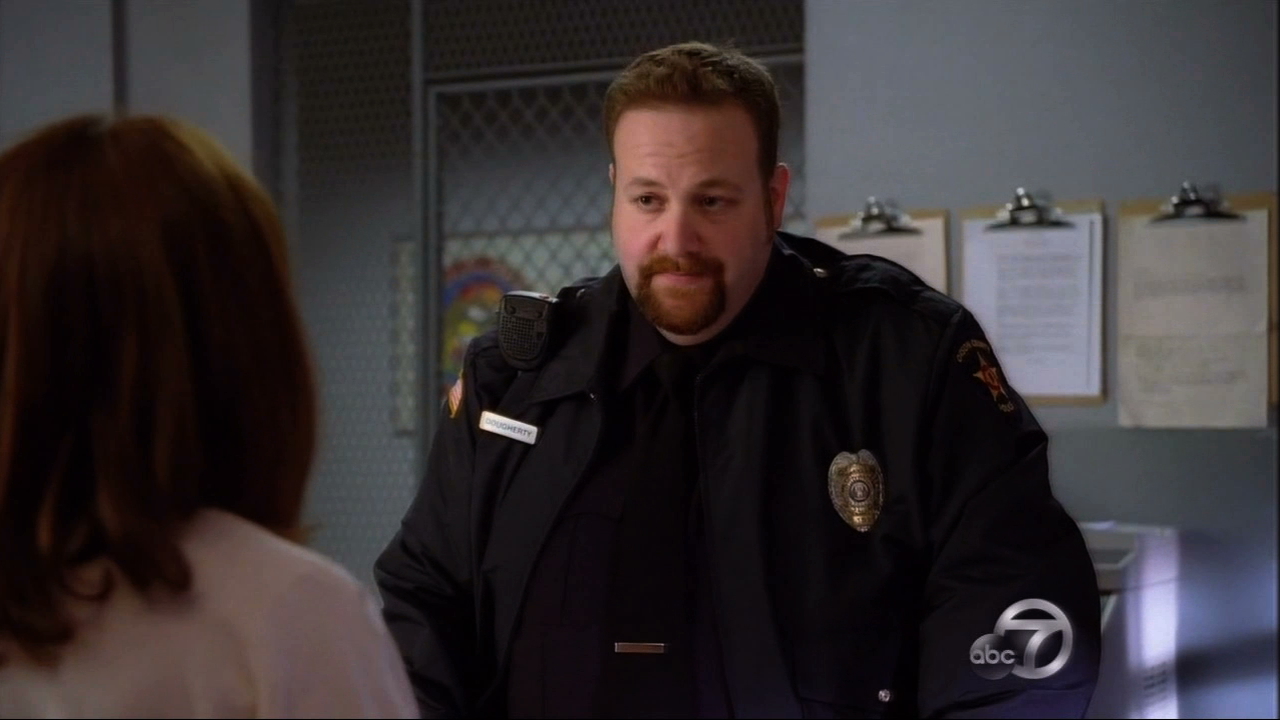 Officer Dougherty (Ben Zelevansky) is not kidding around with Frankie Heck (Patricia Heaton) on 