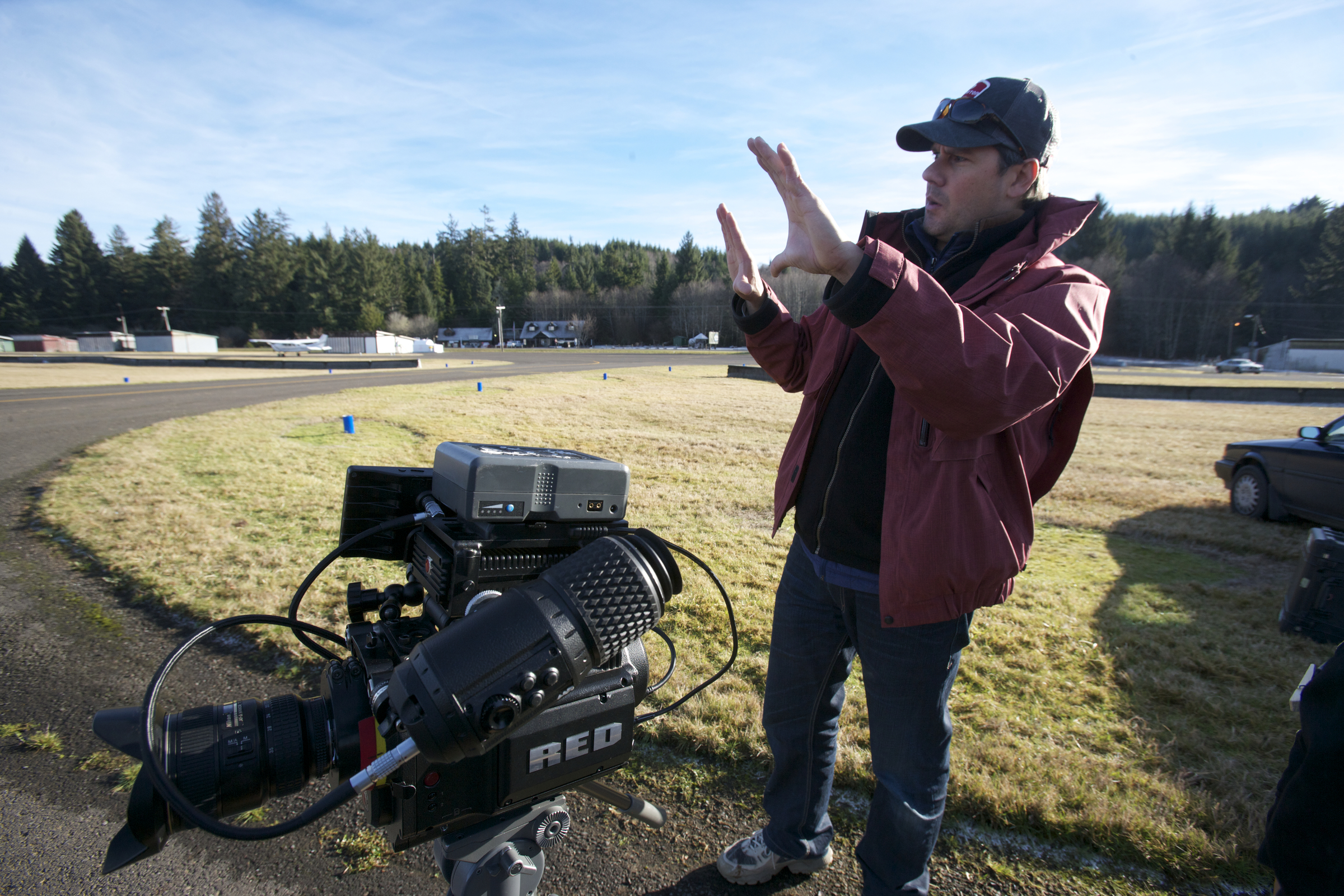 Director Scott A. Capestany framing a shot at a Western WA Airstrip for his TV Series THE RAINFOREST.
