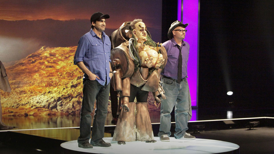 Rod Maxwell and Roy Wooley standing on the winner's spot off Syfy's FACE OFF.