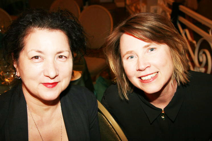 Charlene Rooney (left)accepting the Living Legacy Award - Fine Arts from the Women's International Center 2014