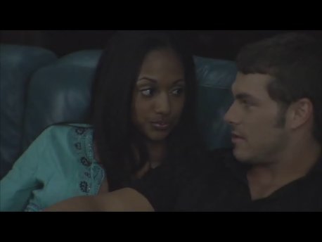 Shari (JaNae Armogan) and Clark (Shawn Roberts) get close in the horror film Devil's Night