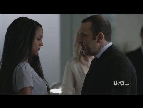 JaNae Armogan as Olivia with Rick Hoffman as Louis in SUITS