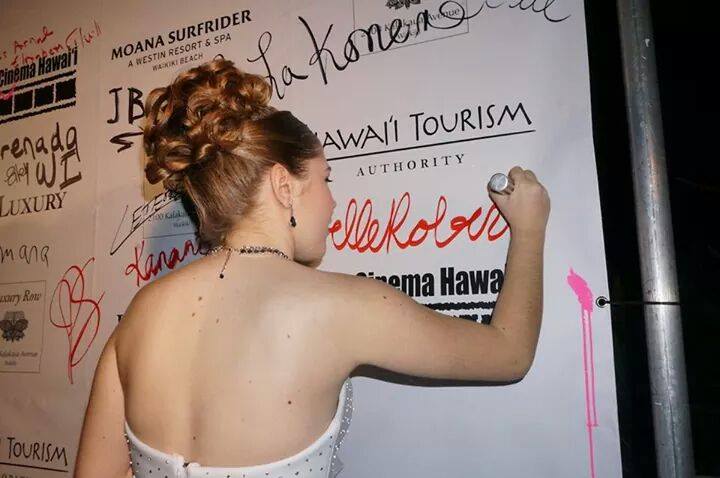 Annabelle Roberts signing her name, at the 5th annual Eurocinema/Hawaii International Film Festival awards.