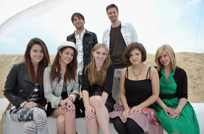 (L-R) Nikita Ramsey, Jade Ramsey, David Robert Mitchell, Amanda Bauer, Brett Jacobsen, Mary Wardell and Claire Sloma attend the 'The Myth of the American Sleepover' Photo Call held at the Martini Terraza during the 63rd Annual International Cannes Film Festival on May 19, 2010 in Cannes, France.