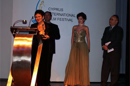 Jenna Constantine accepting the Golden Aphrodite in the Nostimon Imar category for THE SPIRIT OF THE CHICAGO GREEKS! at the Cyprus International Film Festival in March 2006