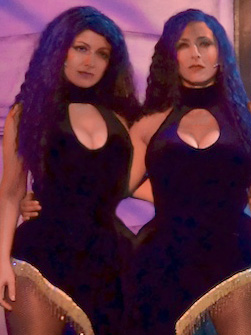 Whitney Avalon as a conjoined twin in CARNEVIL, attached to Liza Baron.