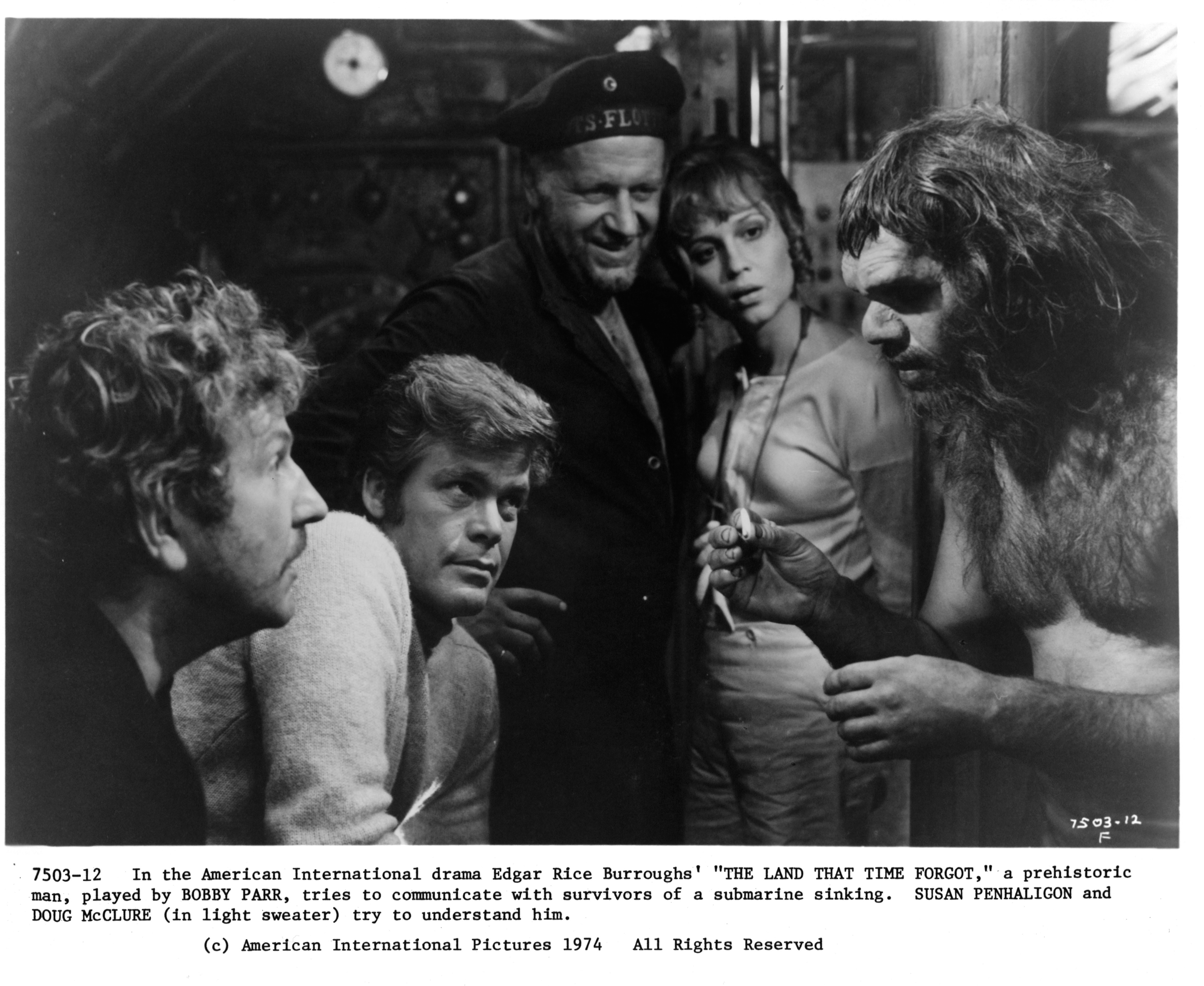 Still of Doug McClure, Bobby Parr and Susan Penhaligon in The Land That Time Forgot (1975)