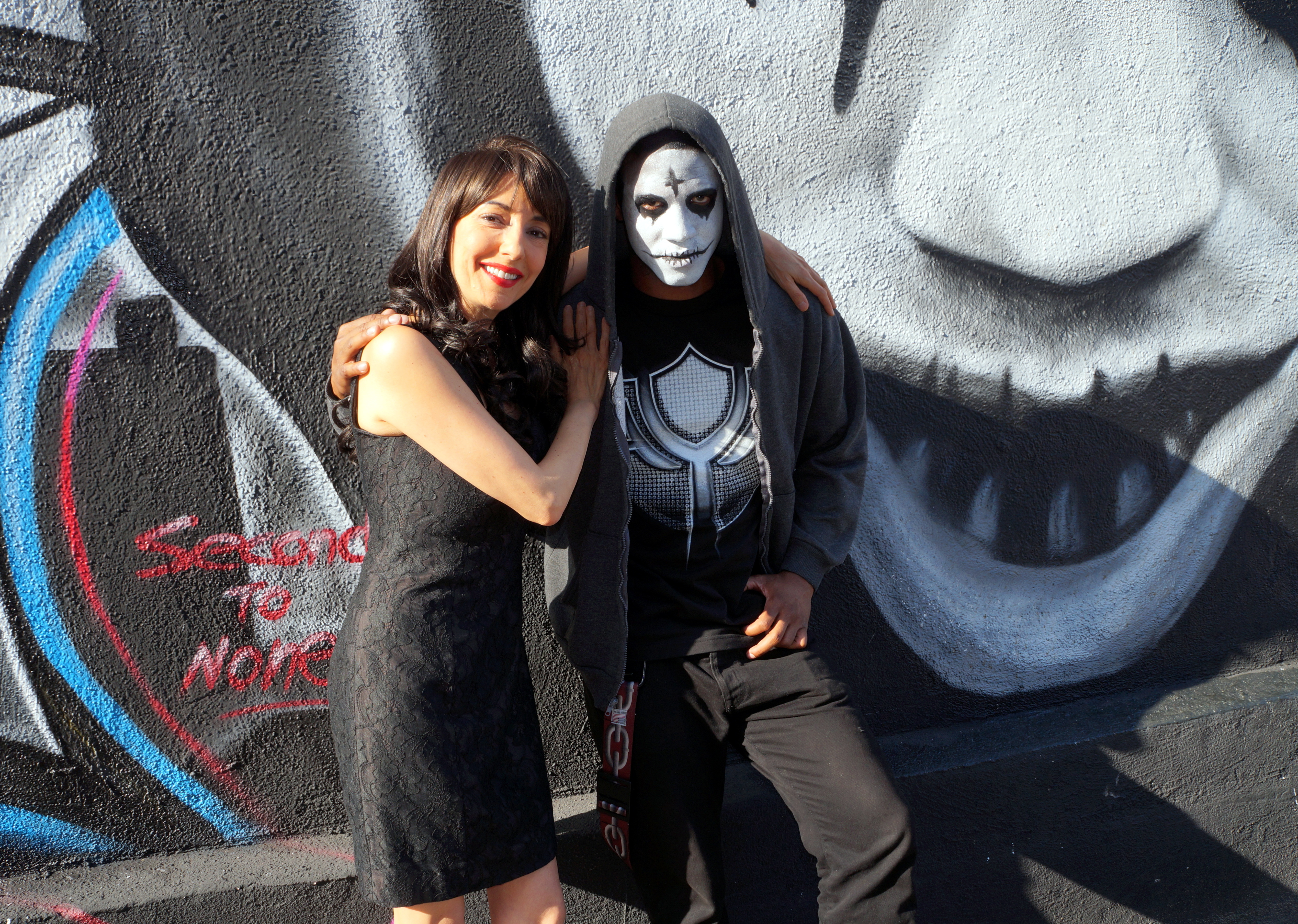 Luciana Lagana with The Purge: Anarchy actor Emanuel Powell at Skate for Kids event of the Garage Boardshop Youth Center in East Los Angeles on 08/09/2014