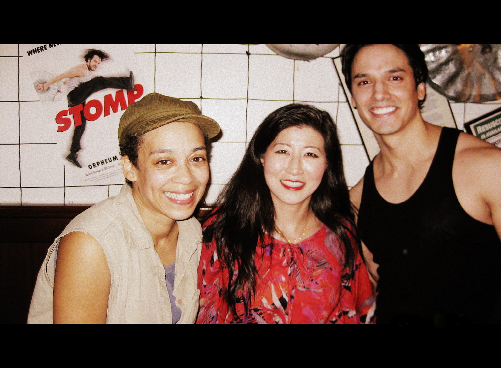 Lil Rhee with cast members of Stomp