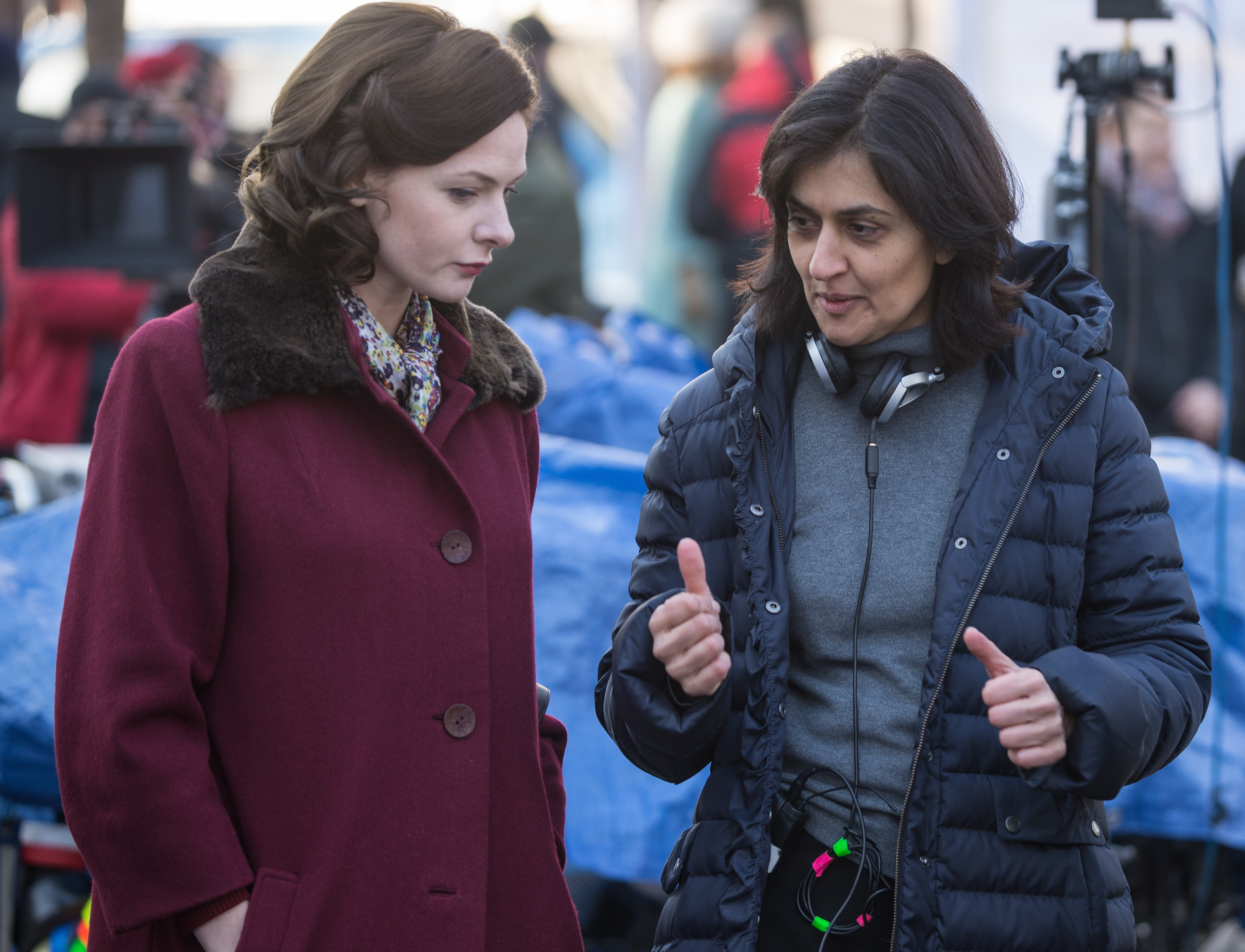 Rebecca Ferguson (as Katya) with director Shamim Sarif discussing a shot for Despite the Falling Snow