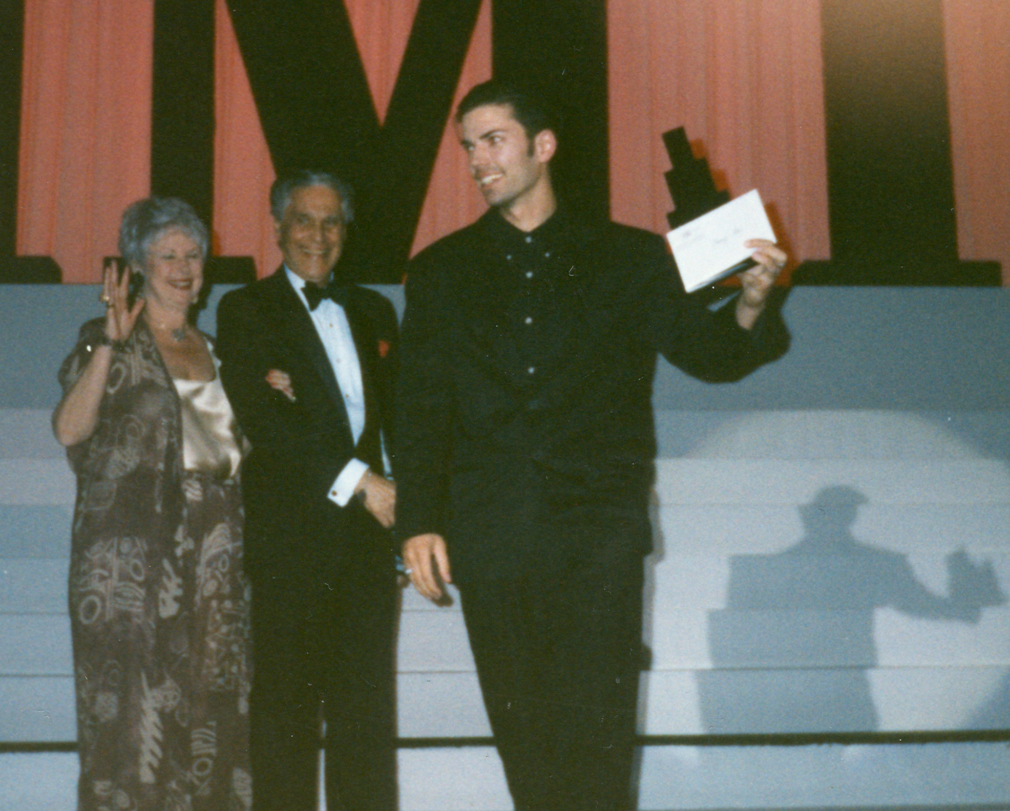 Sacha Pommepuy (far right) accepting an award for dramatic acting at the IMTA.