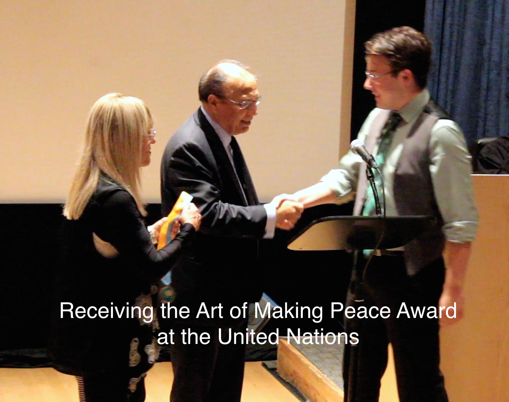 Receiving The Art of Making Peace Award from Ambassador Anruwal Chowdhury at the United Nations 2014. Matthew received this award for his film 