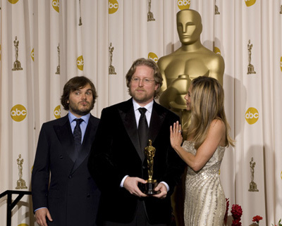 Academy Award®-winner Andrew Stanton (center) with presenters (left to right) Jack Black and Jennifer Aniston backstage at the 81st Academy Awards® are presented live on the ABC Television network from The Kodak Theatre in Hollywood, CA, Sunday, February 22, 2009.