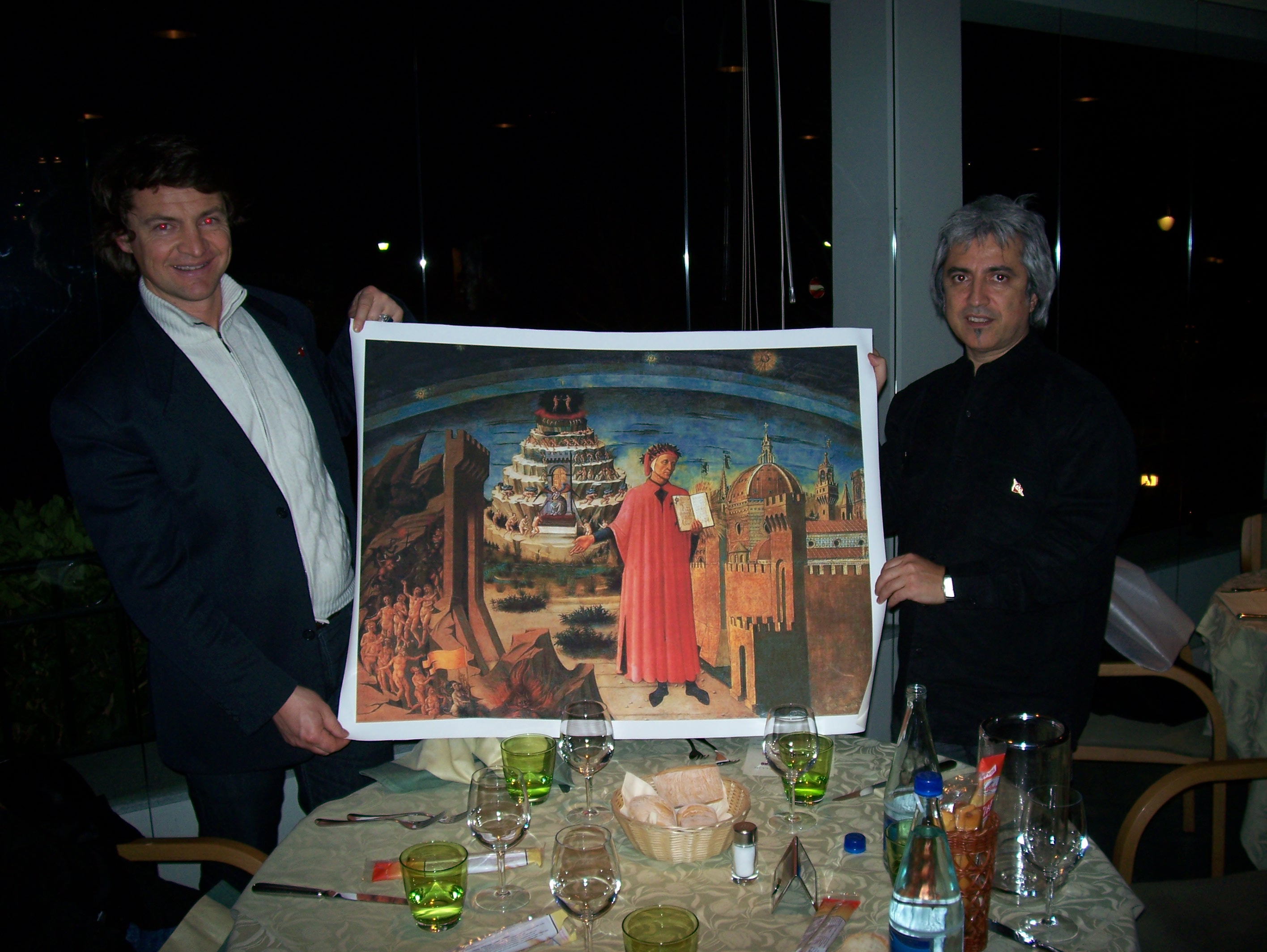 Giulio Di Bernardi receives from Boris Acosta the Domenico di Michelino Divine Comedy giclee on canvas for his Divine Comedy museum in Bellagio, Italy