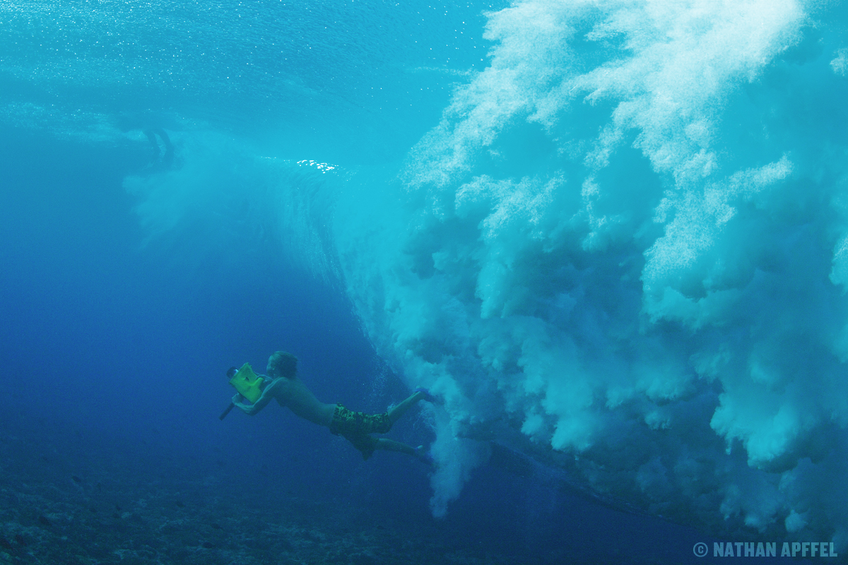 On location shooting 20 foot waves in Tahiti.