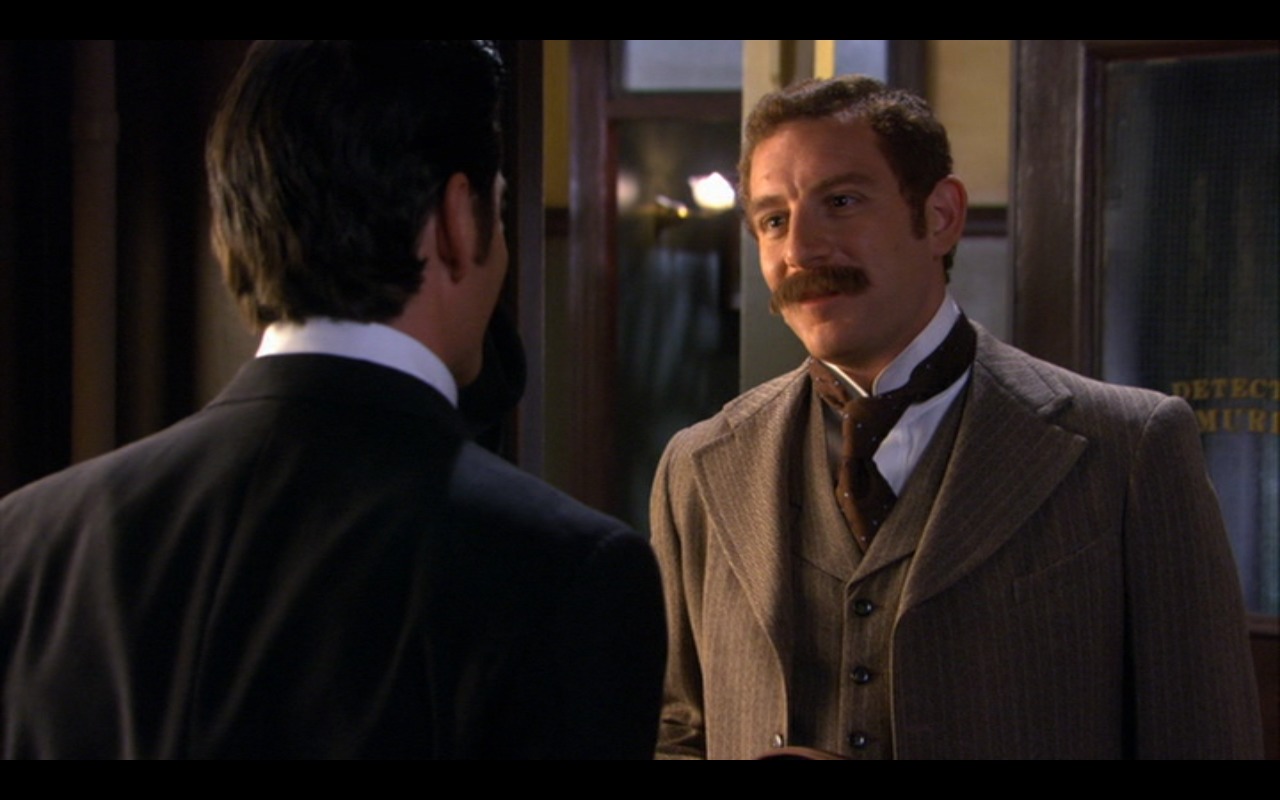 Yannick Bisson as William Murdoch, Peter Mikhail as HG Wells, Murdoch Mysteries.