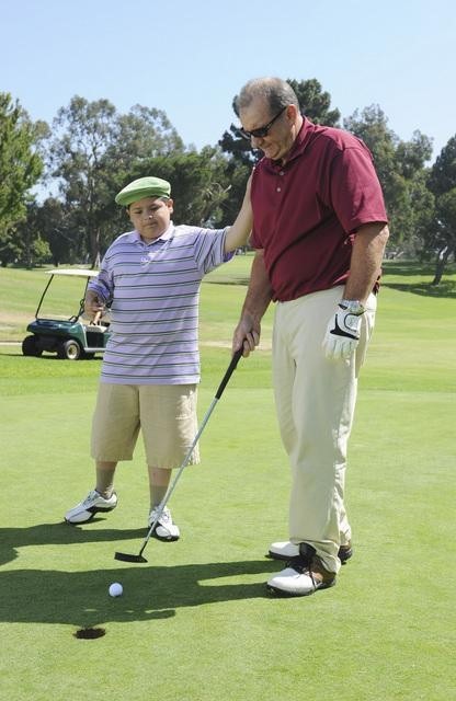 Still of Ed O'Neill and Rico Rodriguez in Moderni seima (2009)