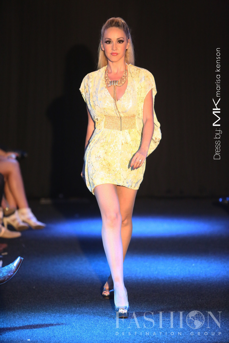 Recording Artist and Actress Aria Johnson walks the runway at the Sail In Style event, wearing Marisa Kenson in 2012.