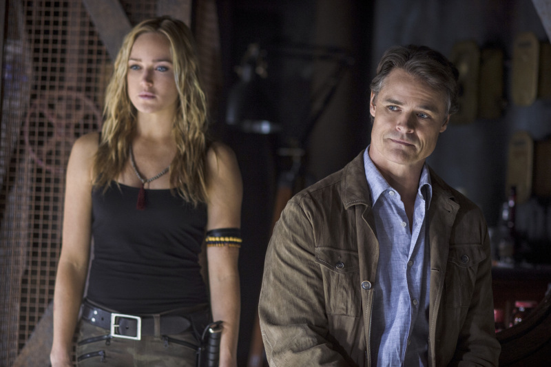 Still of Dylan Neal and Caity Lotz in Strele (2012)